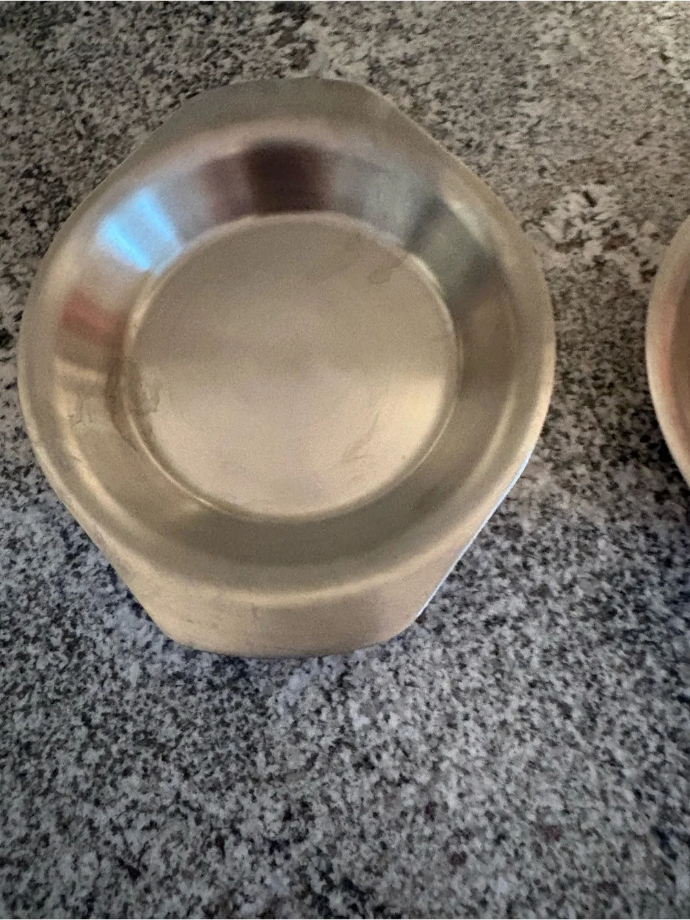 Set of two copper coated oval bowls